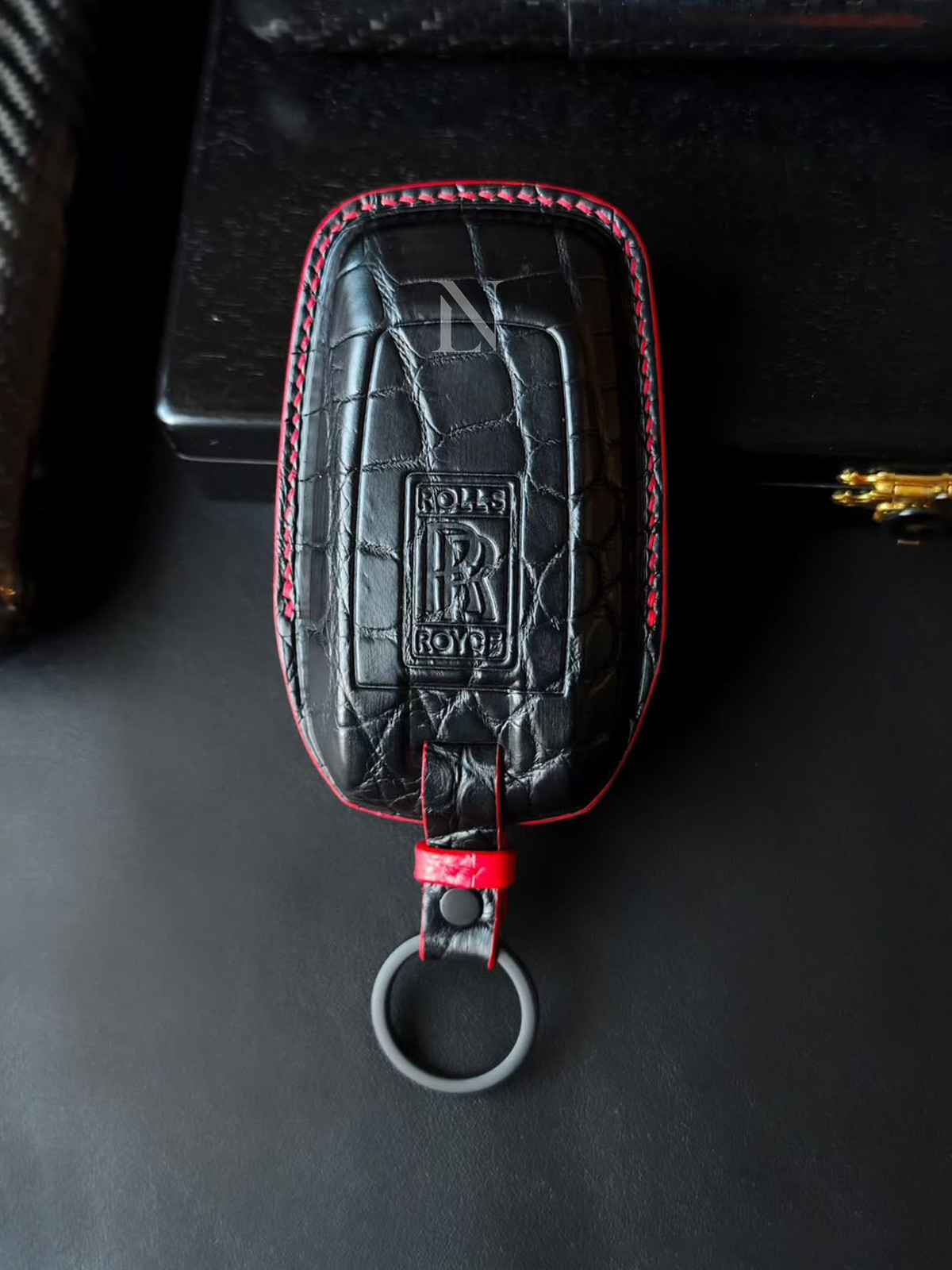 Black crocodile leather Rolls-Royce car key case with red stitching