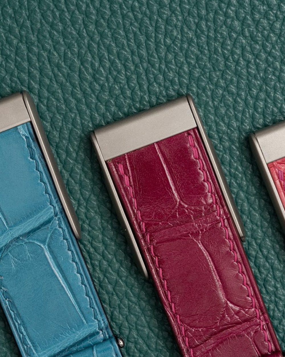 Noire Leathers crocodile straps laid out in the workshop