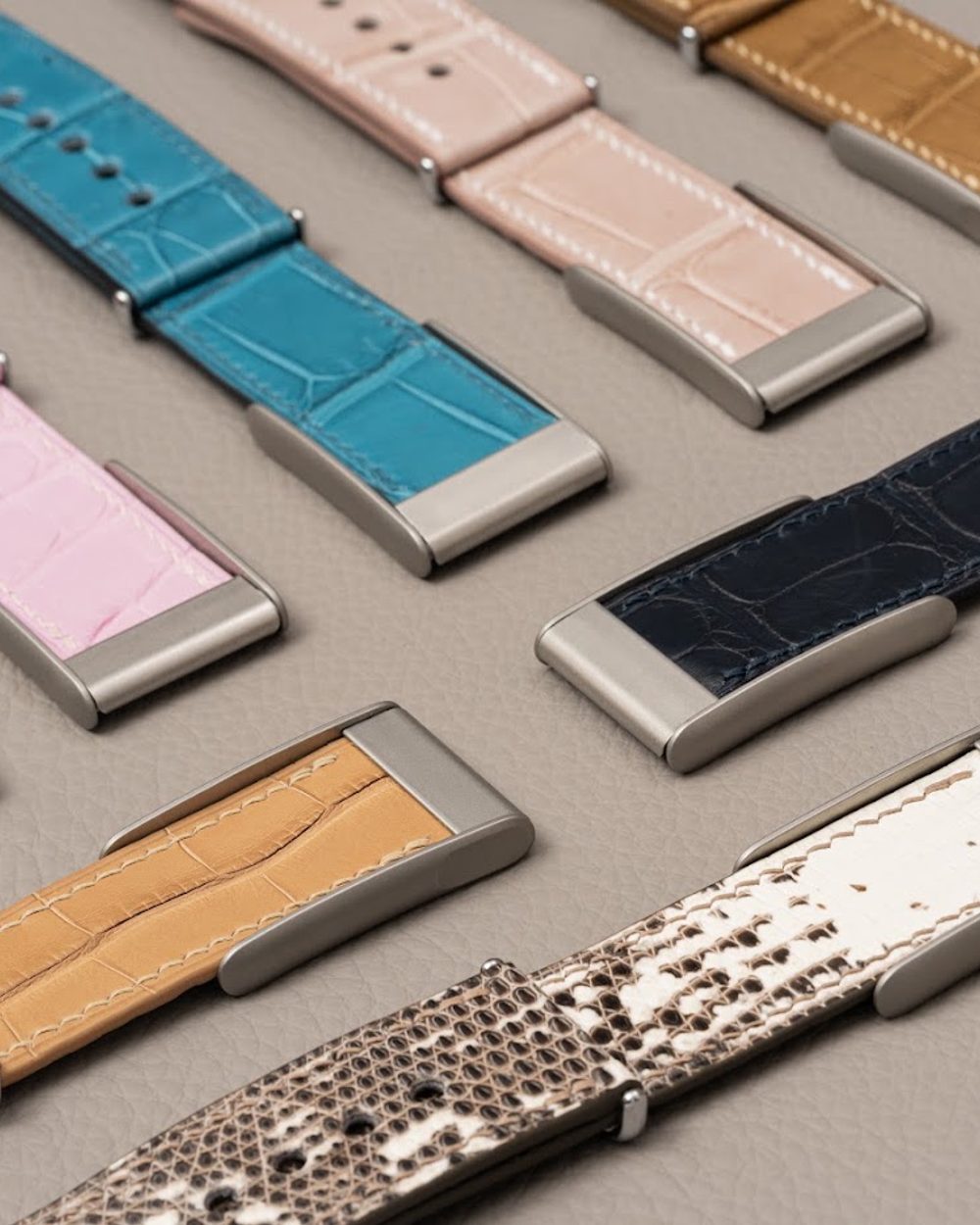 Noire Leathers crocodile straps laid out in the workshop